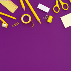 Fototapeta premium School supplies on purple background. Top view. Back to school. Flat lay.