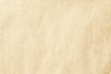 Brown crumpled paper with grains texture closeup