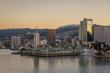 Fototapeta na wymiar Exposure done at Sunrise of downtown Honolulu while arriving by cruise ship in beautiful Hawaii.