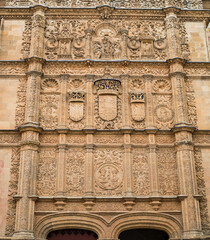 Detail of the stone carved facade above the doorway to the Esculeas Mayores of Salamanca University