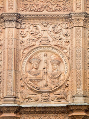 Detail of the stone carved facade above the doorway to the Esculeas Mayores of Salamanca University