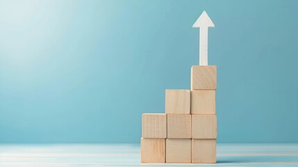 Business growth concept, wooden cube blocks chart steps and white rising up arrow on blue background