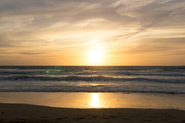 Stunning sunset over sea in Golden Bay Malta.