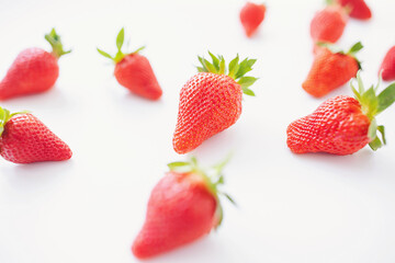 fresh strawberry, selective focus, isolated on white background. Red berry strawberry isolated on blurred background. 