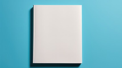 A white book is on a blue background
