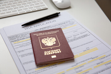 Obraz premium Close up of a visa application document with a Russian passport