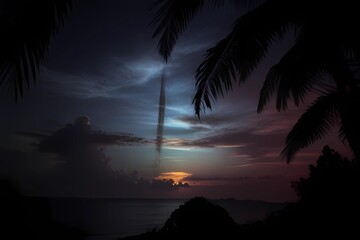 Ocean Palm Tree Tropical Sunset Sky. A tropical ocean sunset, palm tree taken from Tokoriki Island Fiji. Yanuya Island is in the background
