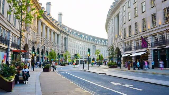 London's Regent Street time lapse vibrant city on summer evening.