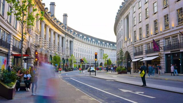 Regent Street London, shoppers and tourists on summer evening time lapse.