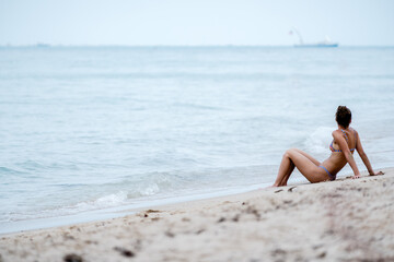 woman relaxing on beach