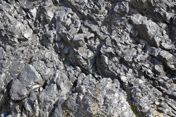 Black Rockface Textured Background