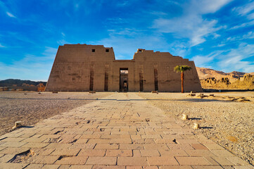 Entrance pylons of the magnificent Temple of Medinet Habu - Mortuary Temple of Ramesses III built...