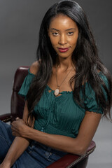 Naklejka premium Woman with long hair posing thoughtfully