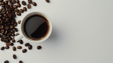 Naklejka premium Coffee cup and beans in a close up shot against a white backdrop