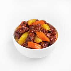 Chinese stewed beef with vegetables on a white background, isolate