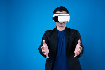 Profile of businessman wearing VR device connecting metaverse, holding stuff in the air isolated...