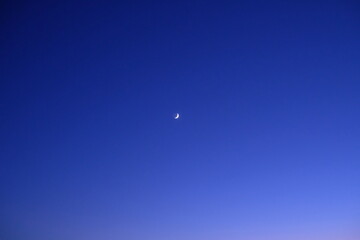 moon in the magic hour sky