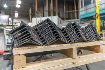 Metal flashing in metal roofing factory workshop
