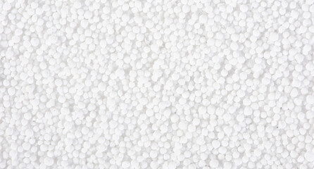 white balls creating abstract texture or background.