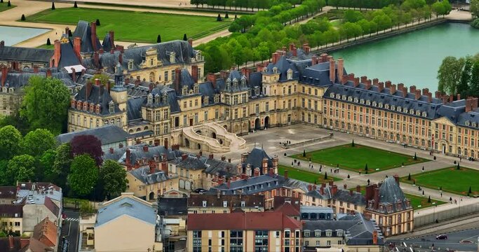Aerial view of medieval landmark royal castle Fontainebleau, France. The Castle of Fontainebleau. Residence of the French monarchs. The Castle of Fontainebleau medieval landmark castle