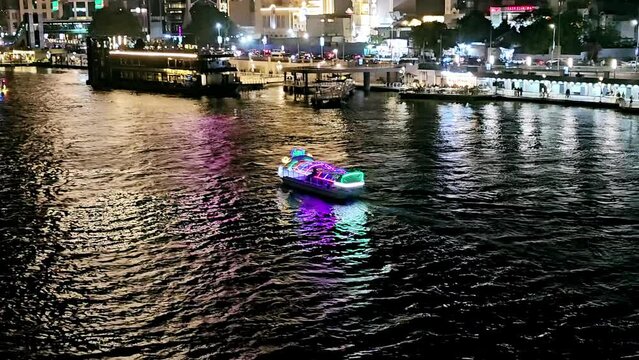 Boats in The river Nile of Egypt at night, the Nile bank and the Egyptian walk on the river coast at the daylight of Cairo city, Nile of Egypt, The Egyptian city night