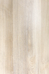 Light colored artificial wood surface.