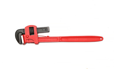 red black pipe wrench isolated on white background