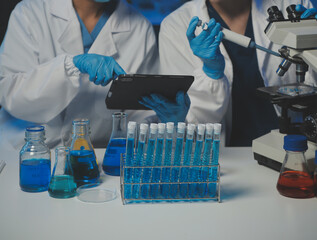 professional chemist woman laboratory using scientific microscope for science research, chemistry scientist with microbiology medicals equipment technology to working with medicine biology experiment