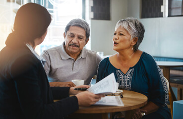 Senior couple, talking and lawyer with documents for financial advice, retirement plan and will at...