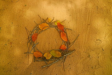 Frame of autumn leaves and branches background