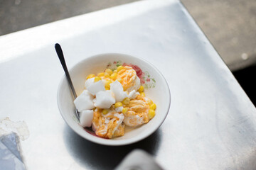 Hard egg coconut ice cream. Ice-cream with fresh coconut milk and hard eggs.
