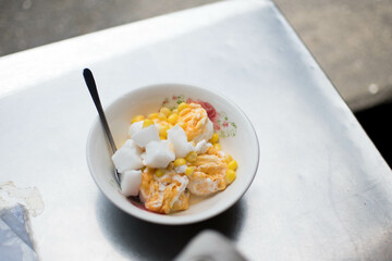 Hard egg coconut ice cream. Ice-cream with fresh coconut milk and hard eggs.