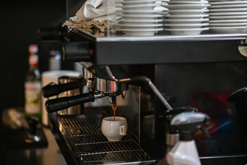 Close-up of barista preparing caffe