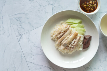 Closed up chicken garlic rice with black soybean and soup, Singapore famous street food