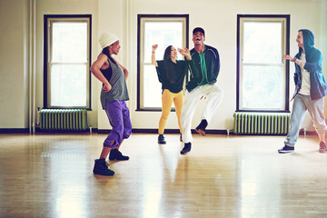 Fototapeta premium Hiphop, class and group dancer movement, talent and performance and people practice together for competition. Dance, music and culture with diversity friends with energy, fun and art expression