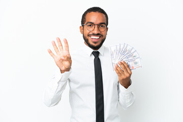 Young business latin man taking a lot of money isolated on white background happy and counting four...