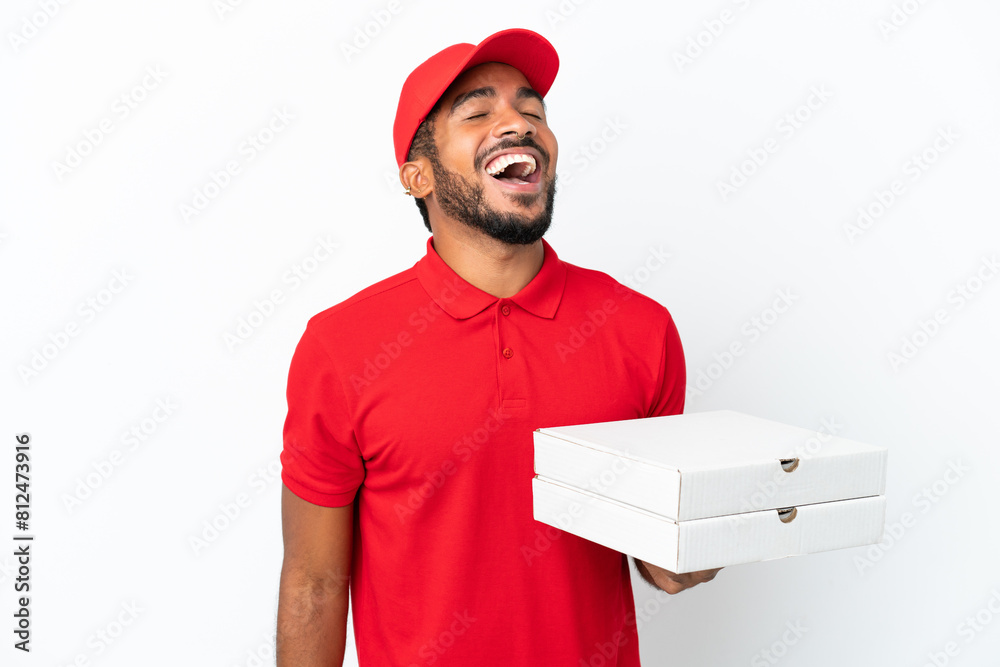 Canvas Prints pizza delivery man picking up pizza boxes isolated on white background laughing