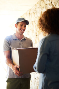 Delivery man, home and package delivery for courier service and e commerce with logistics, transport and supply chain. Customer and worker at front door with box, parcel or order for shopping product