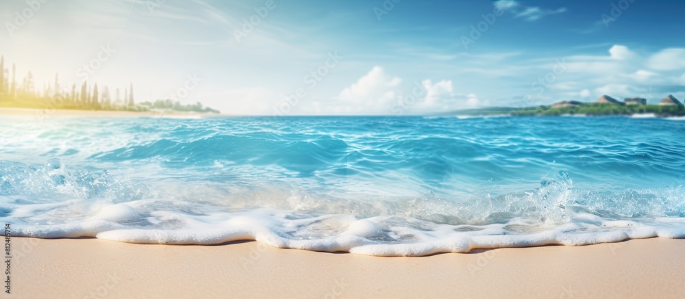 Poster Abstract background with a blurred tropical beach and bokeh sunlight waves providing ample copy space for an image