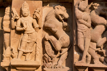 Khajuraho, India: World-famous reliefs on temple facades. Sandstone temples date back to the 10th...