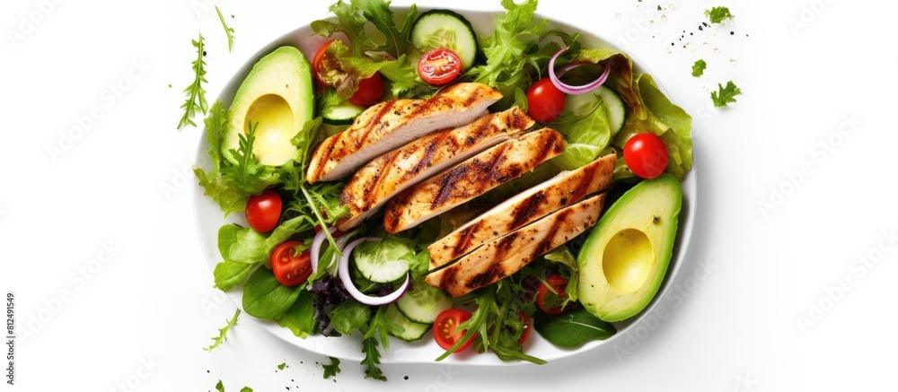 Poster A healthy lunch featuring grilled chicken fillet and vegetable salad topped with avocado photographed from above with a white background The image provides empty space for text or other additions