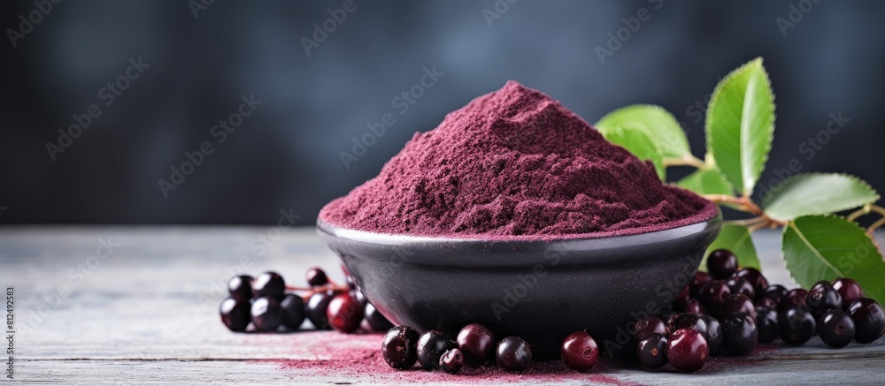 Aufkleber a bowl filled with organic aronia powder and fresh aronia berries is placed on a table with ample co