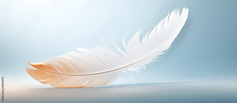 Poster A white feather floats in the air creating an abstract and ethereal ambiance There is ample copy space surrounding the feather