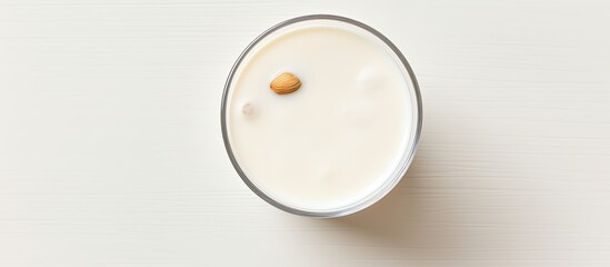 A dairy free nut based drink with milk protein seen from above with plenty of space for copy. Creative banner. Copyspace image