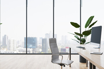 Luxury wooden and concrete coworking office interior with panoramic window and city view, furniture and decorative plants, blinds. 3D Rendering.