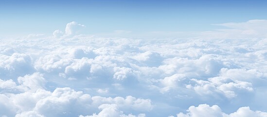 A copy space image of an interface appearing against a backdrop of white clouds and a blue sky - Powered by Adobe