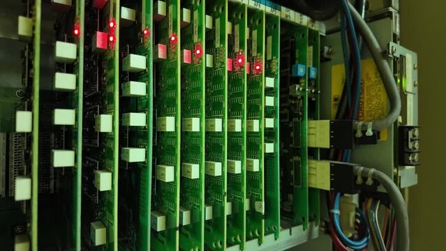PABX phone motherboard with a flashing light indicating the digital connection status. communication technology