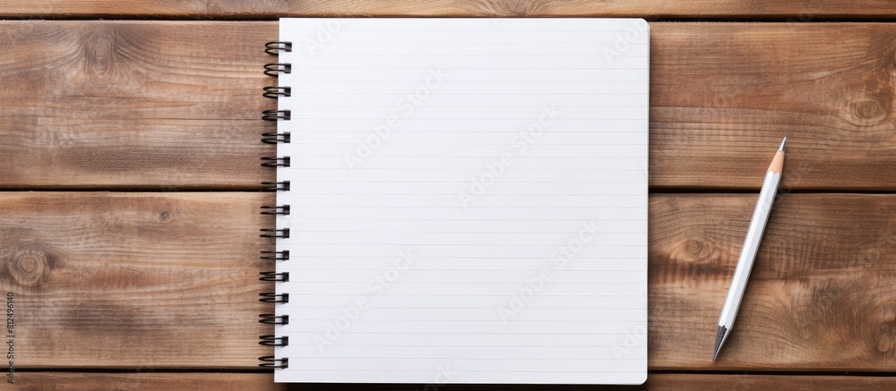 Fototapete a copy space image featuring a notebook and pencil placed on a rustic wooden background