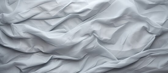 A background image featuring crumpled gray paper providing ample space for adding text or other visuals