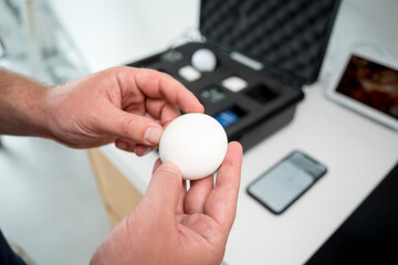 A technician works with a demo kit of the smart home system